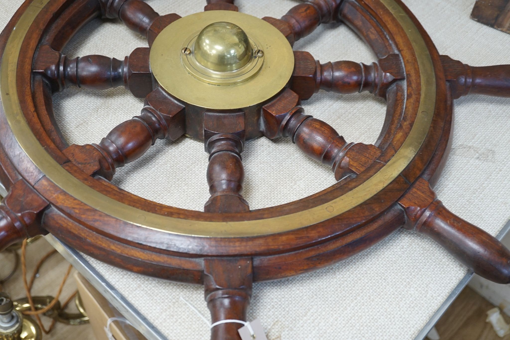 A 19th century mahogany and brass mounted ship's wheel 77cm